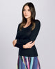 Boglietti's Corr top is crafted from a lightweight knit that layers beautifully under clothes, hitting at the hip on most