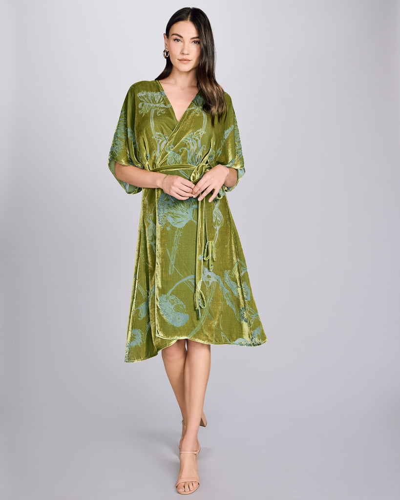 Christine Vancouver's Faberge silk velvet robe has a draped cut with elbow length sleeves and an upper-calf length