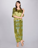 Elegant Faberge lounge pant from Christine Vancouver is crafted from a chartreuse green silk velvet with an ice blue Art Nouveau-inspired floral burnout pattern