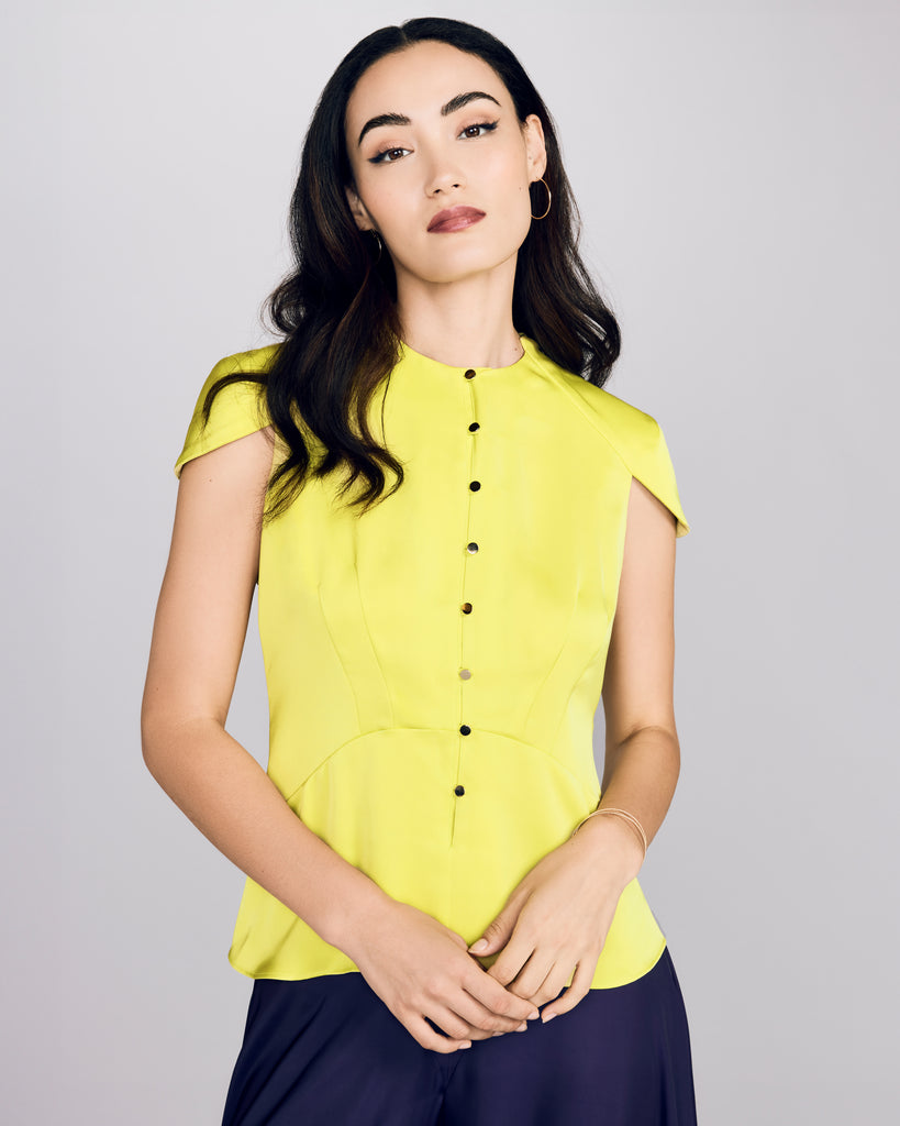 D2Line Blouse has princess seaming and petite gold buttons at the front for fit