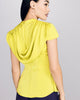 Blouse from D2Line showcases delicate cap sleeves and a draped cowl cape at the back 