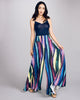 Ultra wide-legged trousers from D2Line are crafted from a multicolored “paintbrush” striped luxury polyester