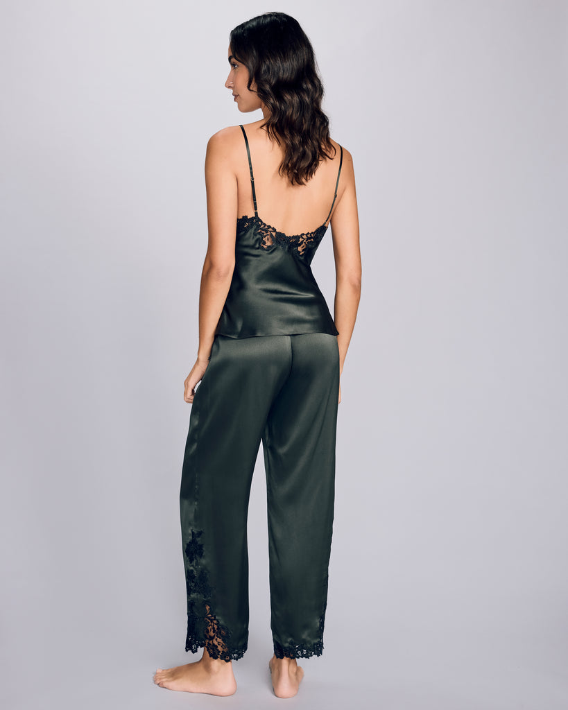 The Clara Moss bias cut camisole from Emma Harris has a low back, thin adjustable spaghetti straps, and appliqué at the entire neckline and back