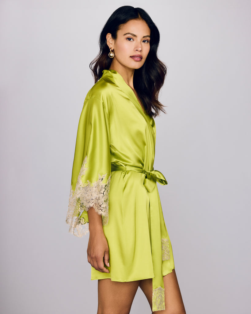 The Rochelle Lime kimono robe from Emma Harris is crafted from neon lime green stretch silk with shimmering golden&nbsp;lace