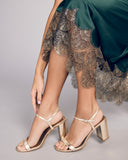 Exquisite gold lace at the hem of Gilda & Pearl's Matinee midi silk slip dress