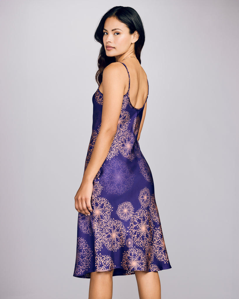 The Edo Hanabi Violine silk slip dress from Karma on the Rocks hits below the knee on most, with a scoop neckline and lower scooped back