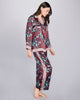 Classic button-down top on Karma's Kazari Aqua silk pajama has a generous fit with a notched collar, red piping, and contrast print at the collar, cuffs and hem