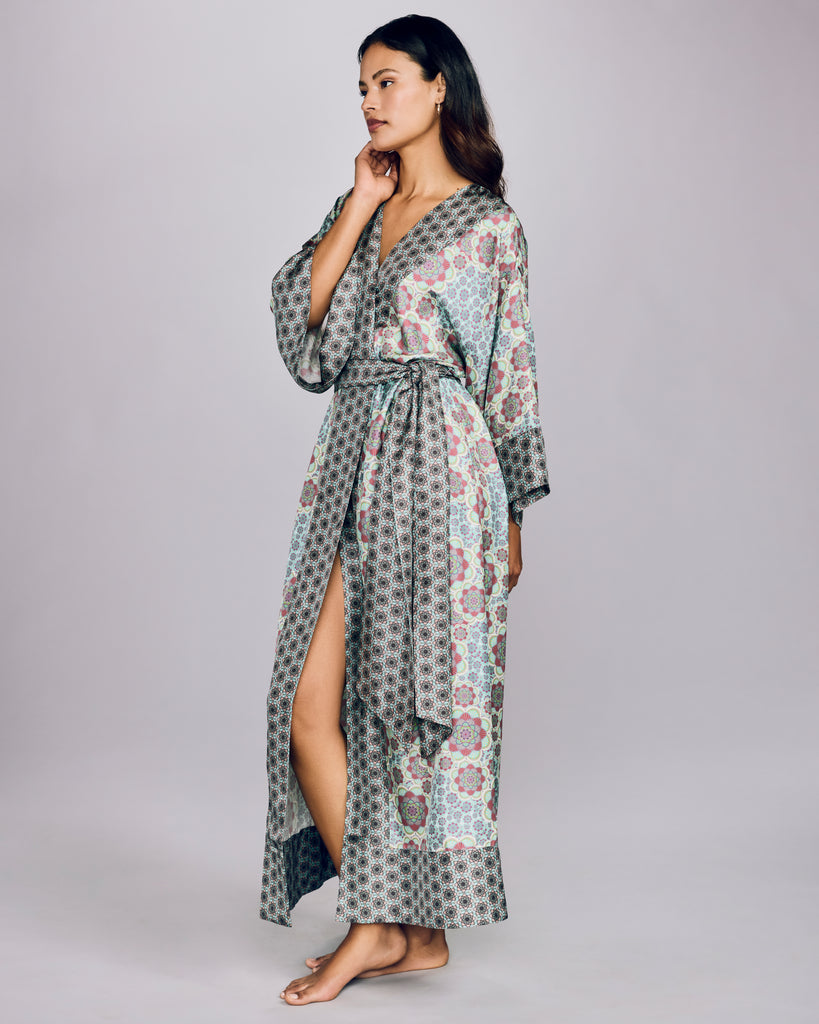 Full length Kobe Mozaicu Aqua robe from Karma on the Rocks is crafted from a aqua blue silk twill with a geometric floral print in shades of pink, purple, green and blue with contrast geometric patterning