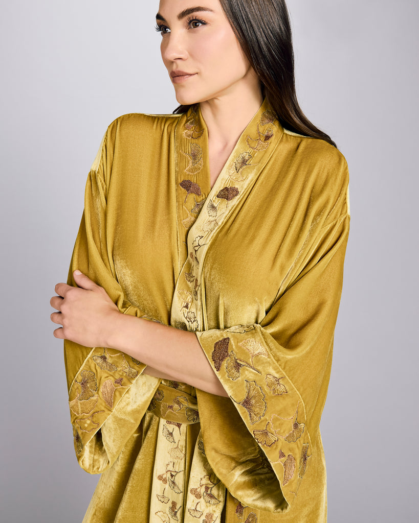 Full length Nikko robe from Karma on the Rocks is crafted from a decadent golden yellow silk velvet with a gingko embroidery in metallic shades of silver, gold and copper at the shawl collar, cuffs and hem