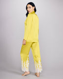 Layalina's Nana pajama trouser has a fully elasticized waist with ivory lace appliqué climbing up from the hem of the pants