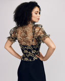 Glamorous RSVP top from Gilda & Pearl showcases glimmering gold French embroidery on sheer black net