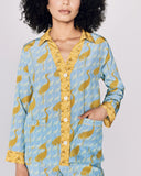 Karma on the Rocks Tokyo Crane silk pajama is crafted from a lightweight pale blue silk crepe de chine with a yellow crane print and contrast yellow floral pattern