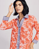 The tailored button-down top on Karma's Tokyo Aka cotton pajama has the contrast trim at the v neckline and narrow collar, mother of pearl buttons