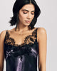 Bias cut Nocturne camisole from Karolina Laskowska and Merle Noir has a scalloped lace overlay at the neckline, lace appliqué at the bust, and adjustable spaghetti straps