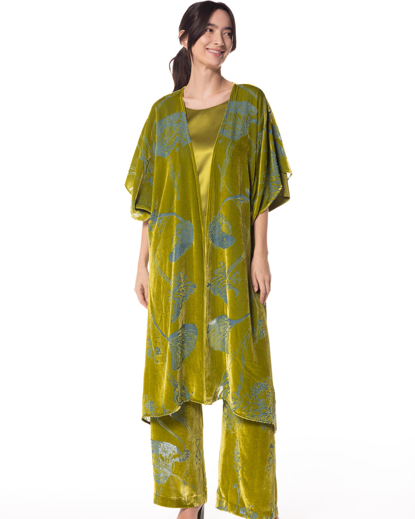 Elegant Fabergé robe by Christine Vancouver is crafted from a chartreuse green silk velvet with an ice blue Art Nouveau-inspired floral burnout pattern