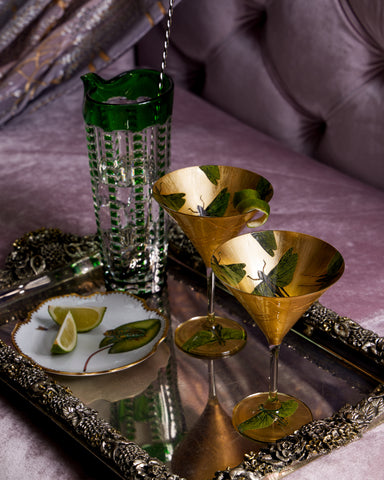 https://www.janesvanity.com/cdn/shop/products/janes-vanity-in-the-style-of-jane-scott-potter-gilded-martini-glasses-green-grasshoppers_large.jpg?v=1657829428