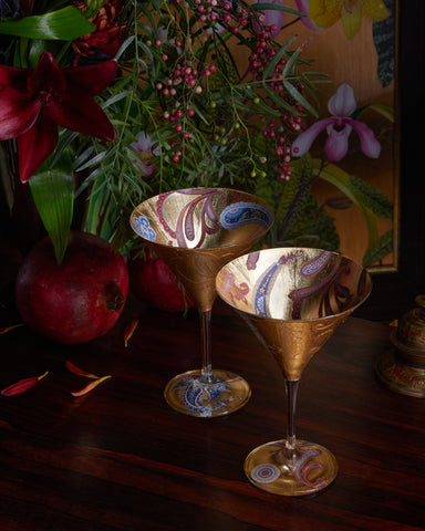 https://www.janesvanity.com/cdn/shop/products/janes-vanity-scott-potter-blue-and-burnt-orange-paisley-martini-glass-set_large.jpg?v=1676432512